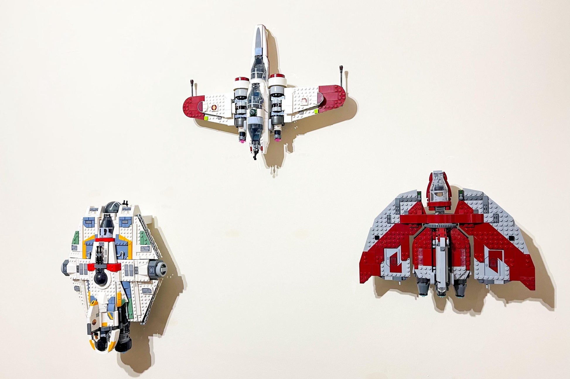 LEGO Star Wars ARC-170 Starfighter (set 75402) wall mounted with Ahsoka's Jedi shuttle and the Ghost spaceship